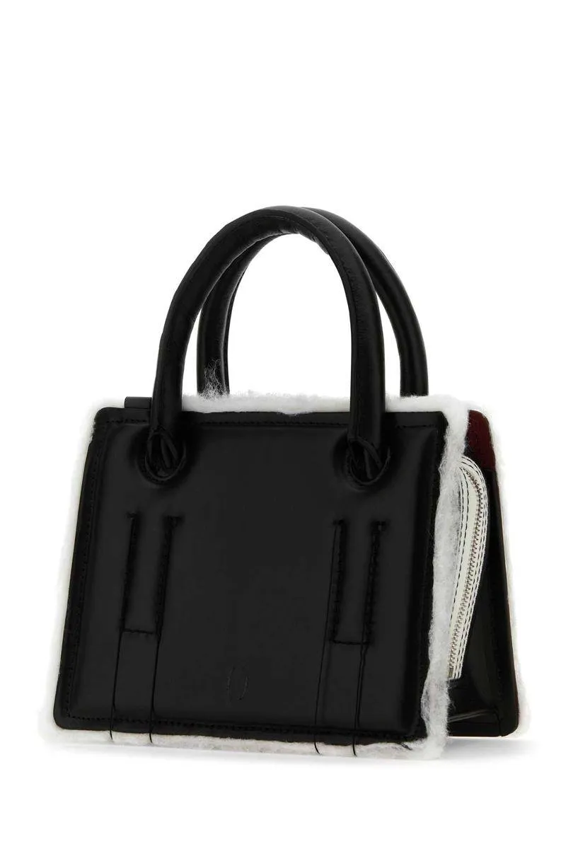 Dentro Handbags
