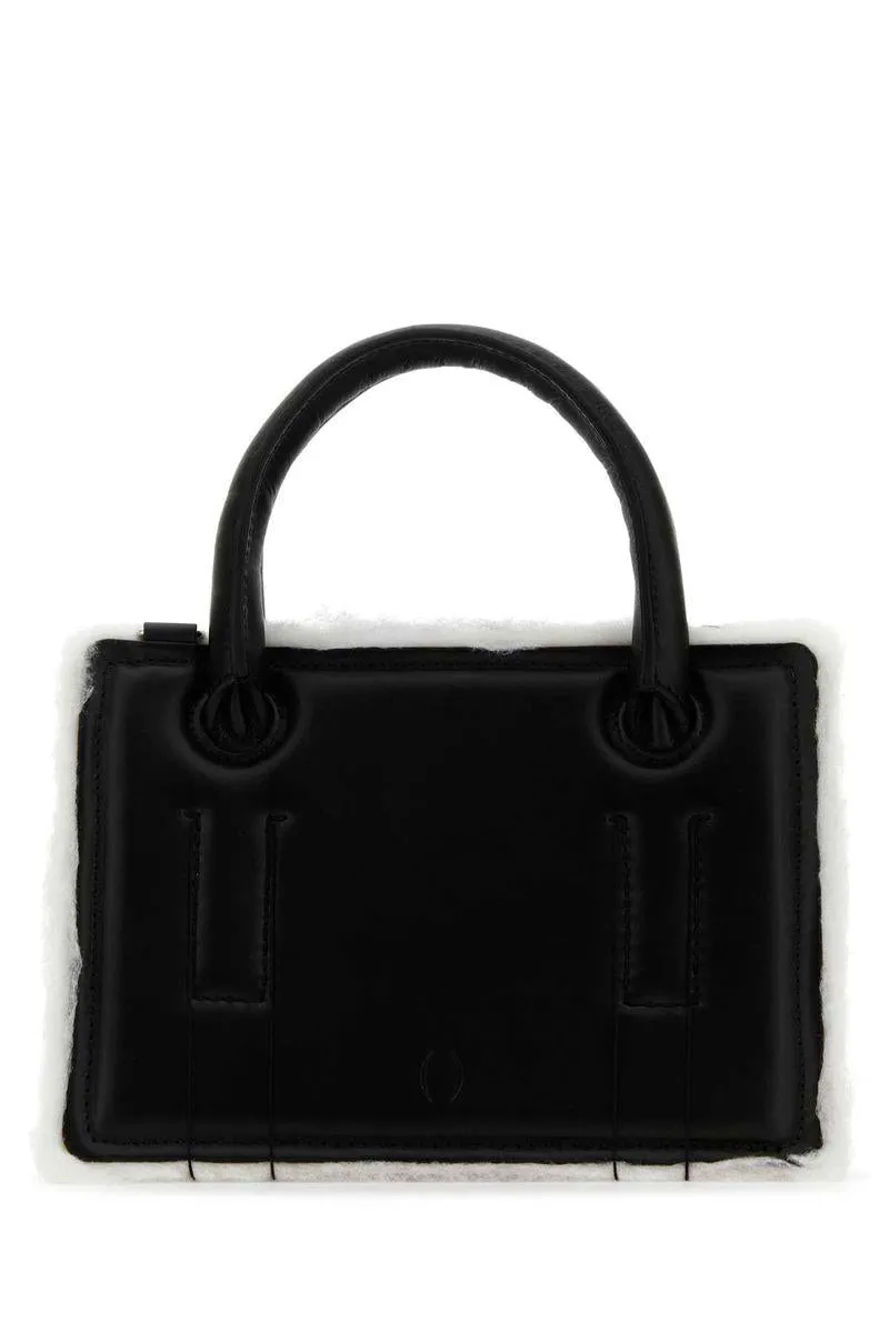 Dentro Handbags