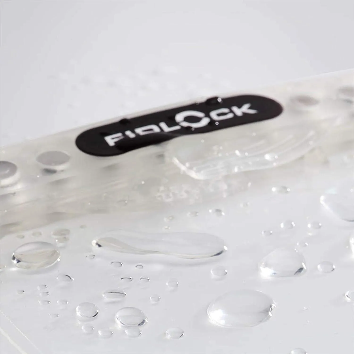 FIDLOCK Hermetic Dry Bag Mini - Flexible Magnetic Self-Sealing Bag for Cellphone | 100% Waterproof and Sand Proof - Practical Size with a Large Opening, with Lanyard included - Transparent
