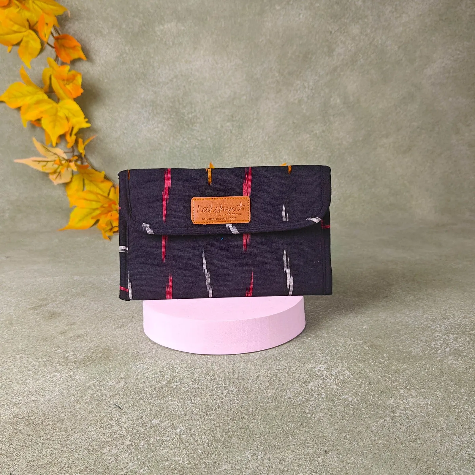 Ikat Clutch Black Colour Red and White Striae Prints.