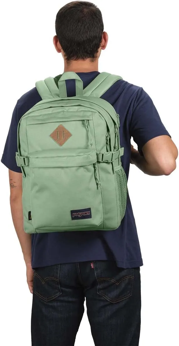 JanSport Main Campus FX Backpack - Travel or Work Bag w 15-Inch Laptop Pack with Leather Trim, Loden Frost