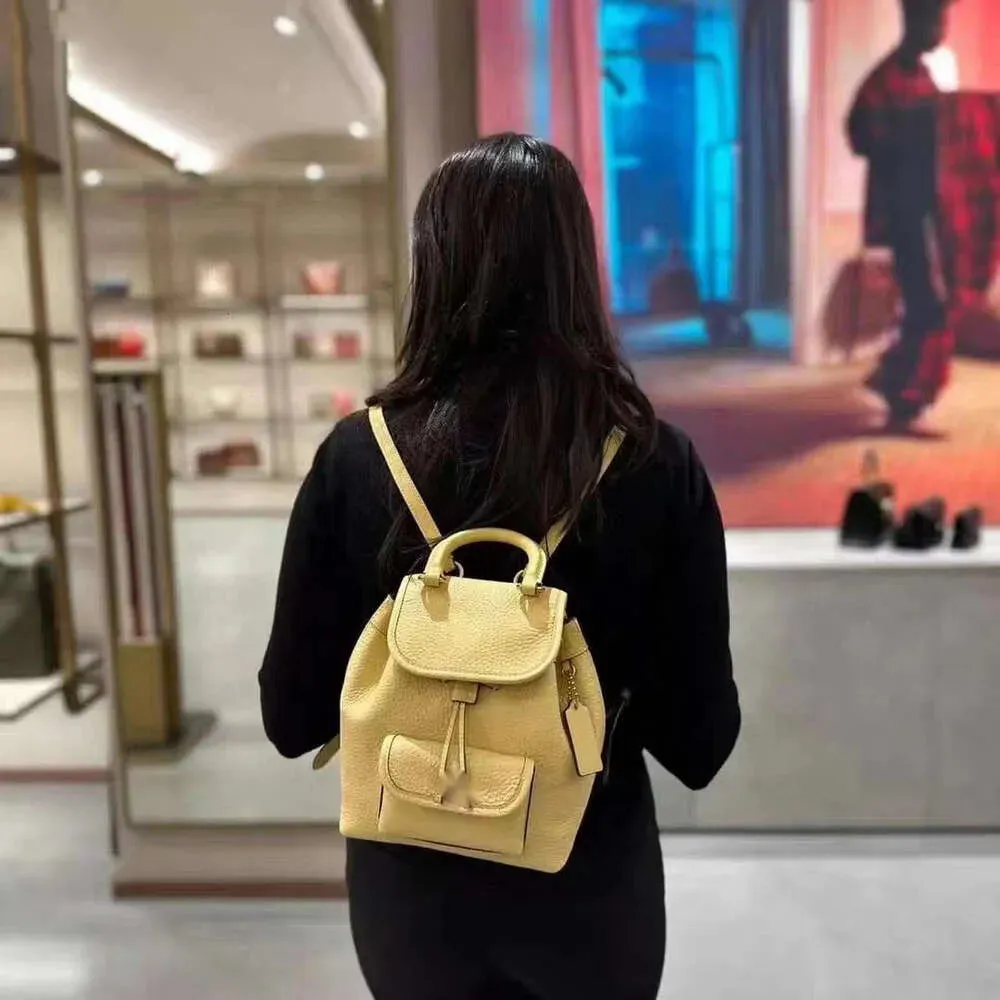 Riya 13 Stay Cord Hasp Opening Closing Backpack Style Designer New Coaches Mini Womens Backpack Versatile Backpack Trend Light Book Bag Macaron Womens Bag