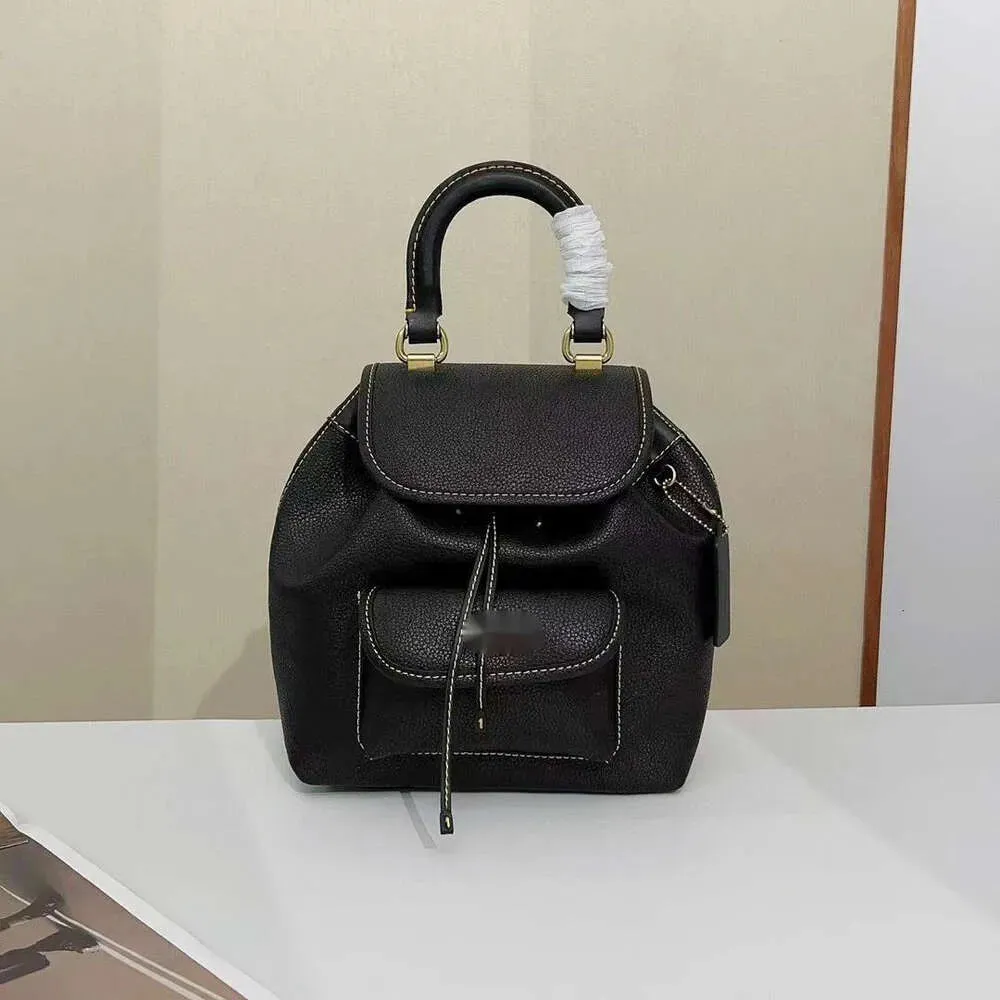 Riya 13 Stay Cord Hasp Opening Closing Backpack Style Designer New Coaches Mini Womens Backpack Versatile Backpack Trend Light Book Bag Macaron Womens Bag