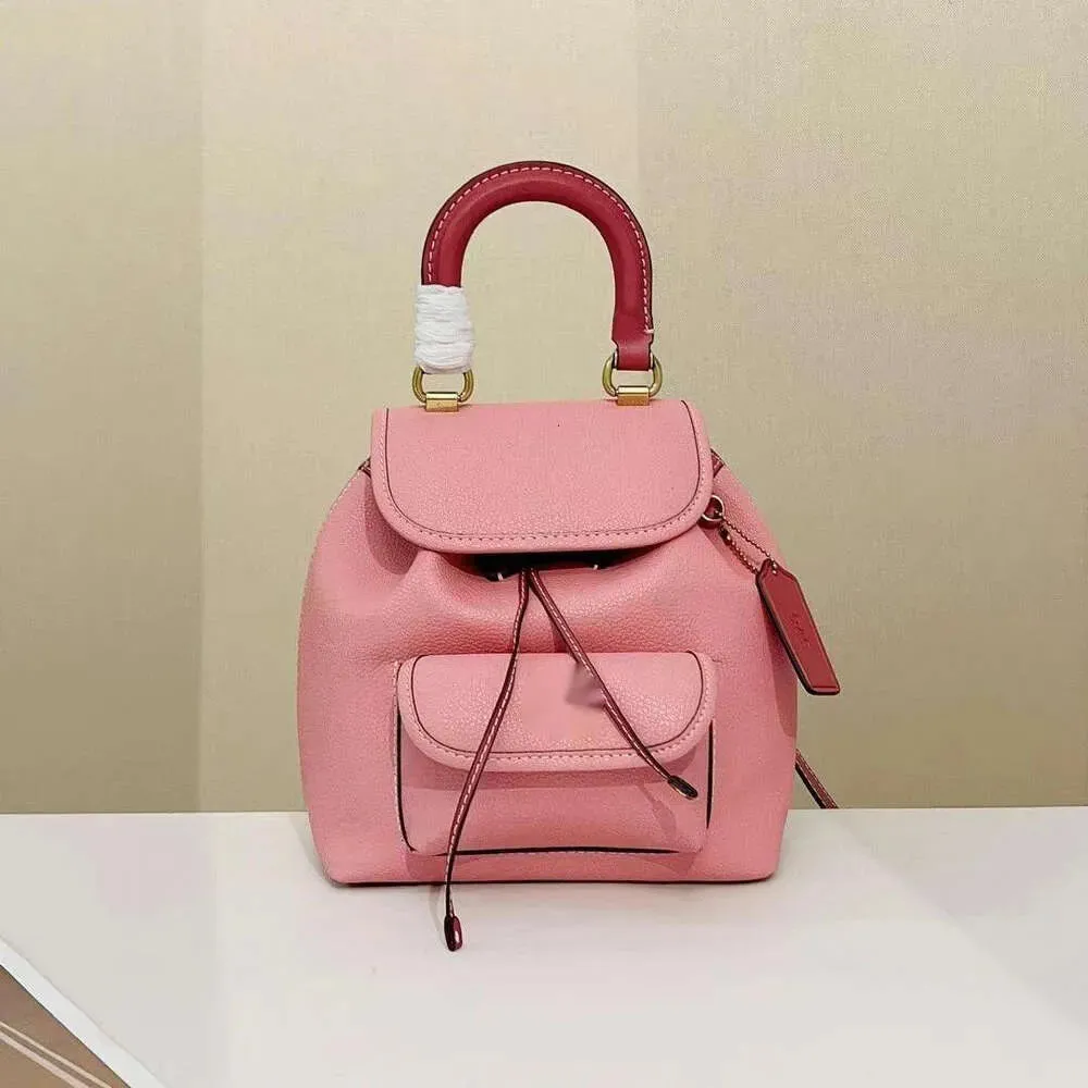 Riya 13 Stay Cord Hasp Opening Closing Backpack Style Designer New Coaches Mini Womens Backpack Versatile Backpack Trend Light Book Bag Macaron Womens Bag